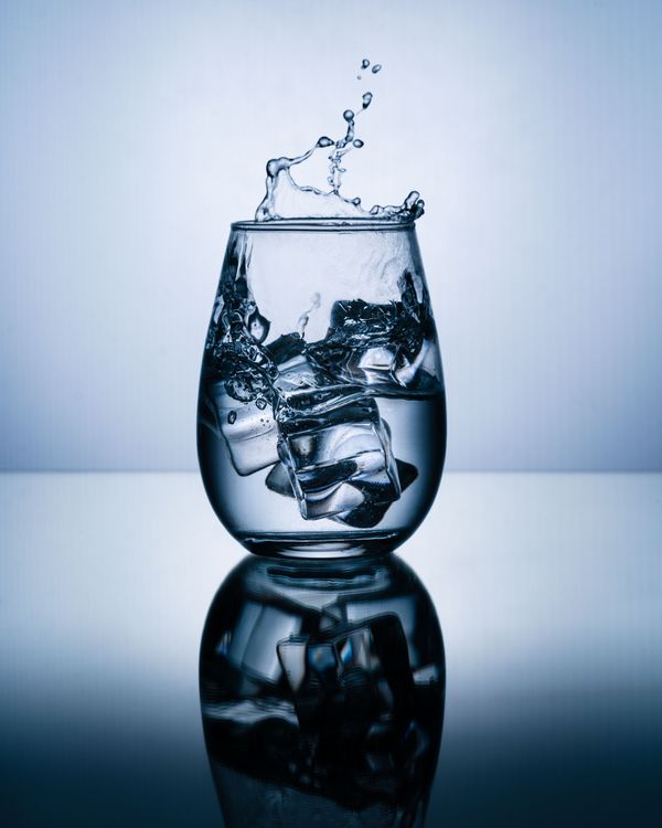 Clear ice cubes in a chilled glass